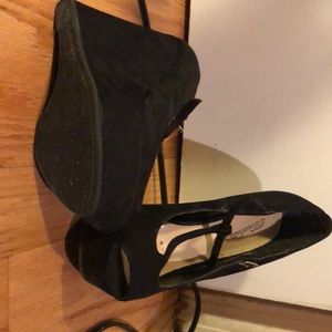 High heeled shoes all black